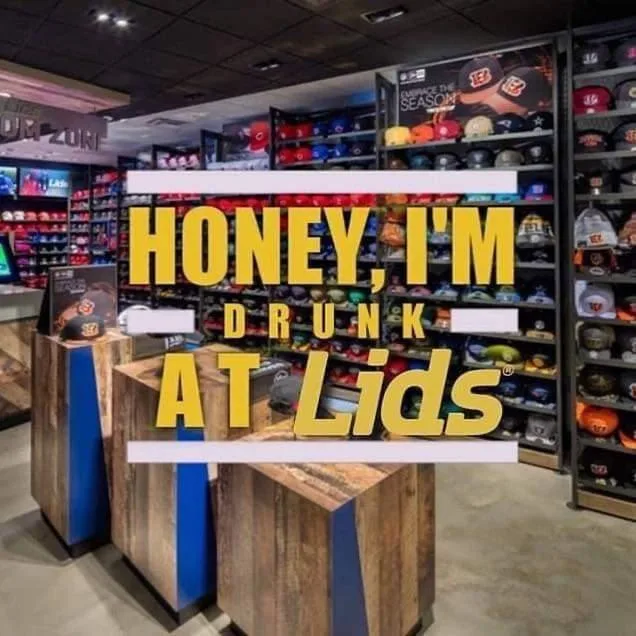 An interior shot of a Lids store filled with shelves of colorful baseball caps and team merchandise. Large yellow text…