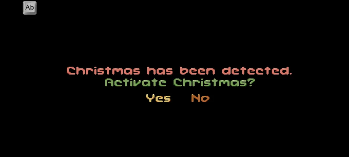 A black screen displays pixelated text in red, green, and orange, mimicking a retro computer prompt. The text reads…