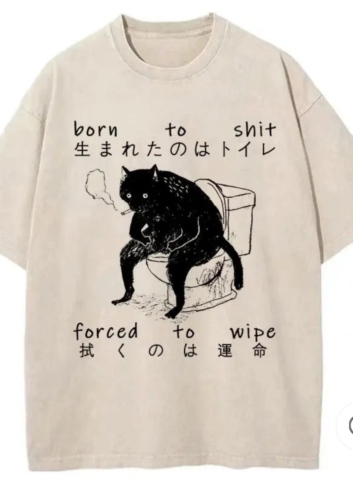 A beige t-shirt features a black ink drawing of a cat sitting on a toilet, smoking a cigarette. Above the cat, text reads…