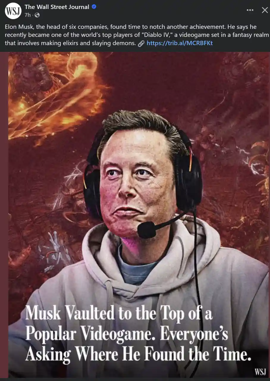 The image shows Elon Musk wearing a headset and a grey hoodie, set against a fiery, demonic background from the game Diablo…