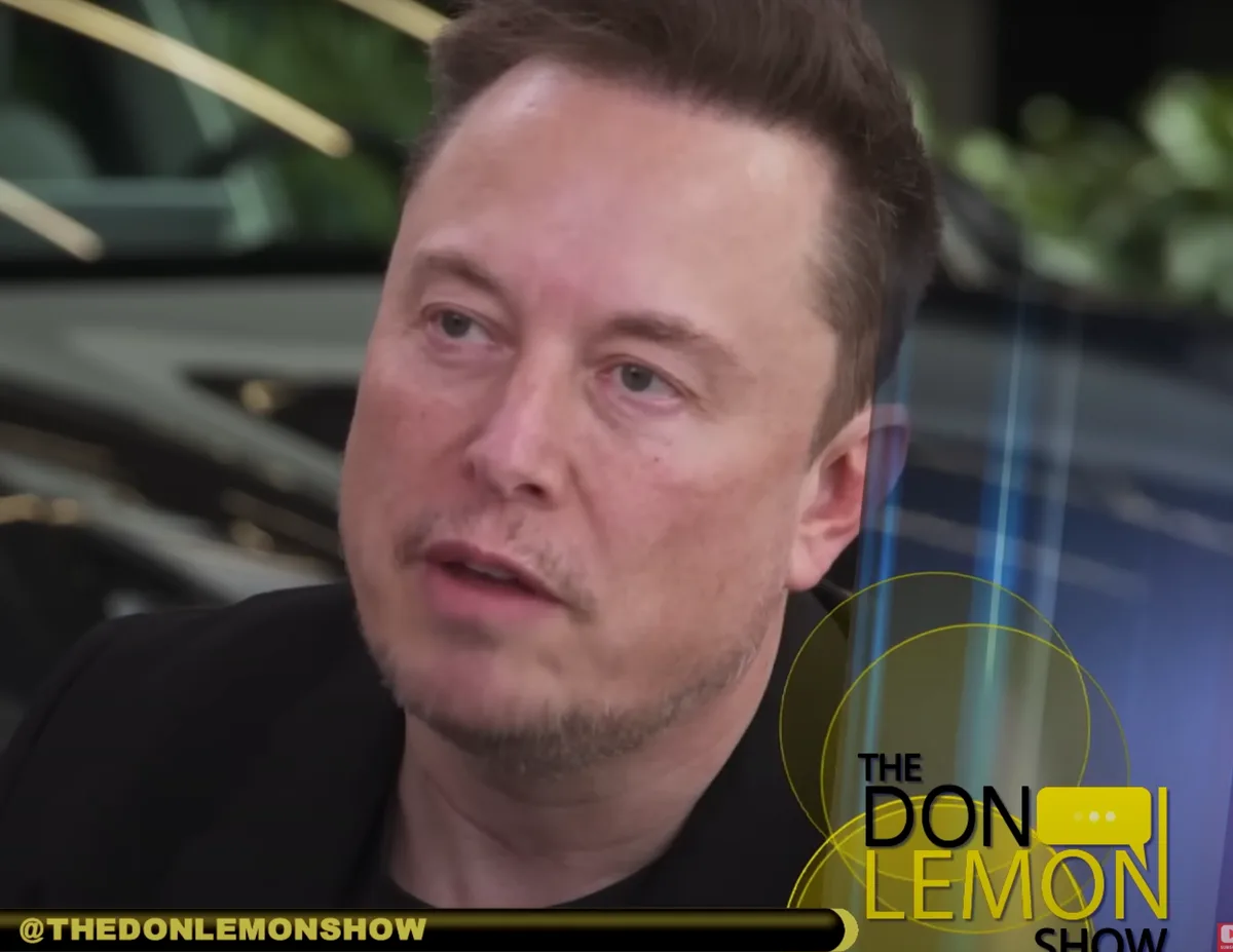 a close-up of elon musk looking slightly to his left with a neutral expression, overlaid with the logo for 'the don lemon…