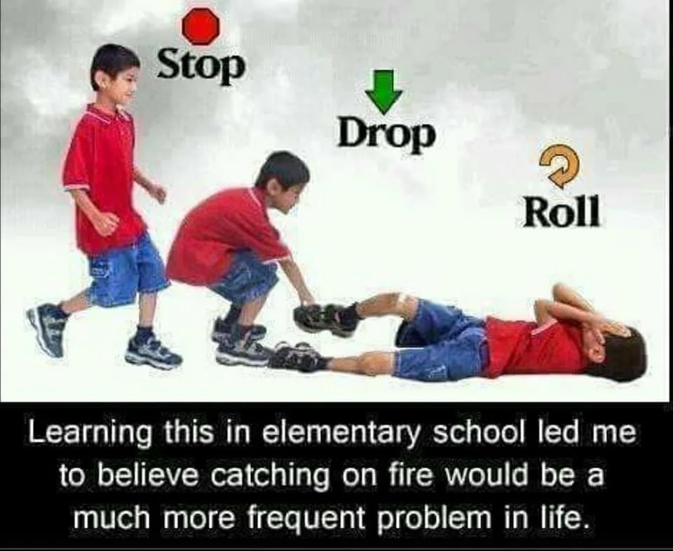 Three boys in red shirts and blue shorts demonstrate the 'stop, drop, and roll' fire safety technique. The first boy stands…