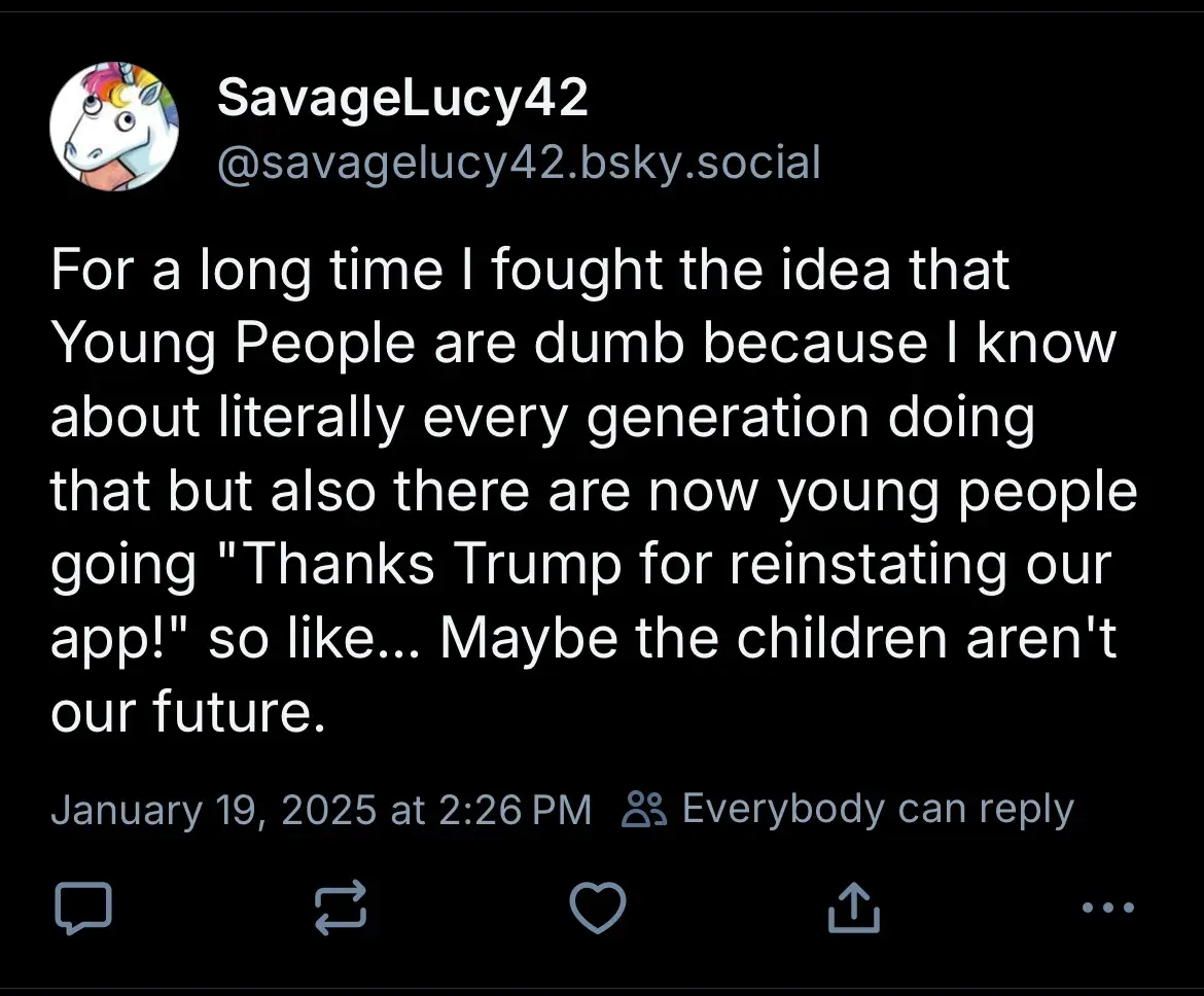 A screenshot of a social media post by 'SavageLucy42' on a platform resembling Bluesky, featuring a white unicorn avatar…