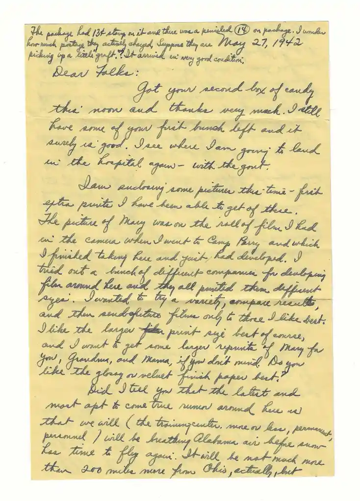 A yellowed handwritten letter dated May 27, 1942, written in cursive script. The letter, addressed to 'Dear Folks,' details…