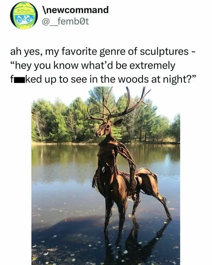 A metal sculpture of a deer with a human-like upper body and antlers stands in shallow water, reflecting in the surface. The…