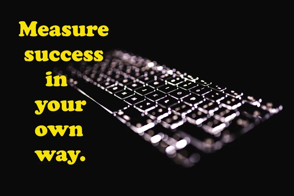 A dark background image of a slightly blurred, angled computer keyboard with glowing keys. Yellow text on the left reads…