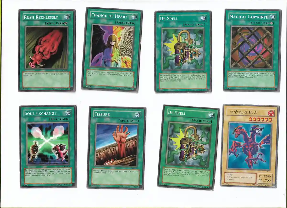Eight Yu-Gi-Oh! trading cards are displayed, including two identical 'De-Spell' magic cards, with overlaid text reading…