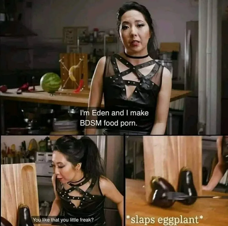 A woman in a black leather outfit with straps and a choker stands in a kitchen, introducing herself as Eden who makes BDSM…