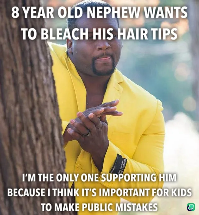 A man in a bright yellow suit stands partially hidden behind a tree trunk, looking concerned with his hands clasped. White…