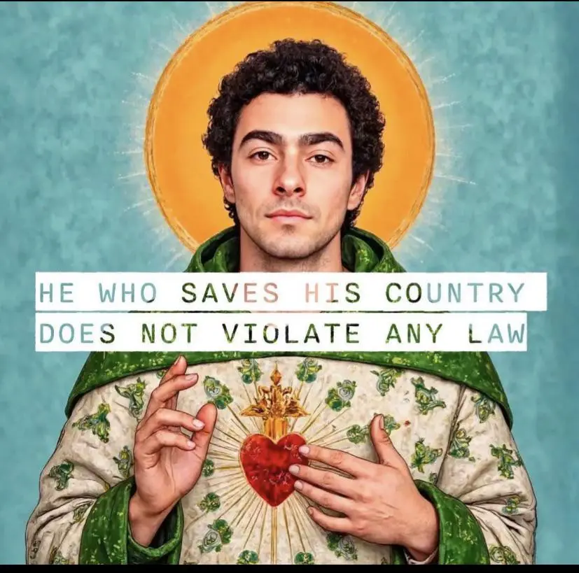 A man with curly dark hair and a serene expression is depicted in a saintly style, wearing ornate green and cream robes with…