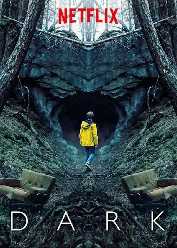 A promotional poster for the Netflix series 'Dark' shows a person in a yellow jacket walking toward a dark cave entrance in…