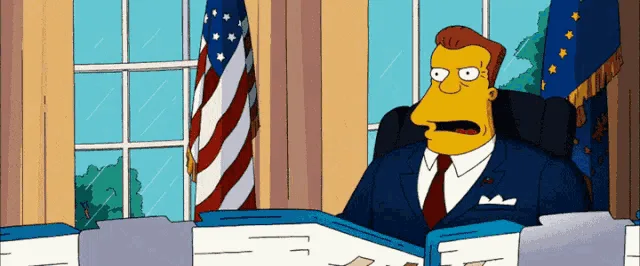 The image shows a sequence of frames featuring the animated character Nelson Muntz from The Simpsons sitting at a desk in an…