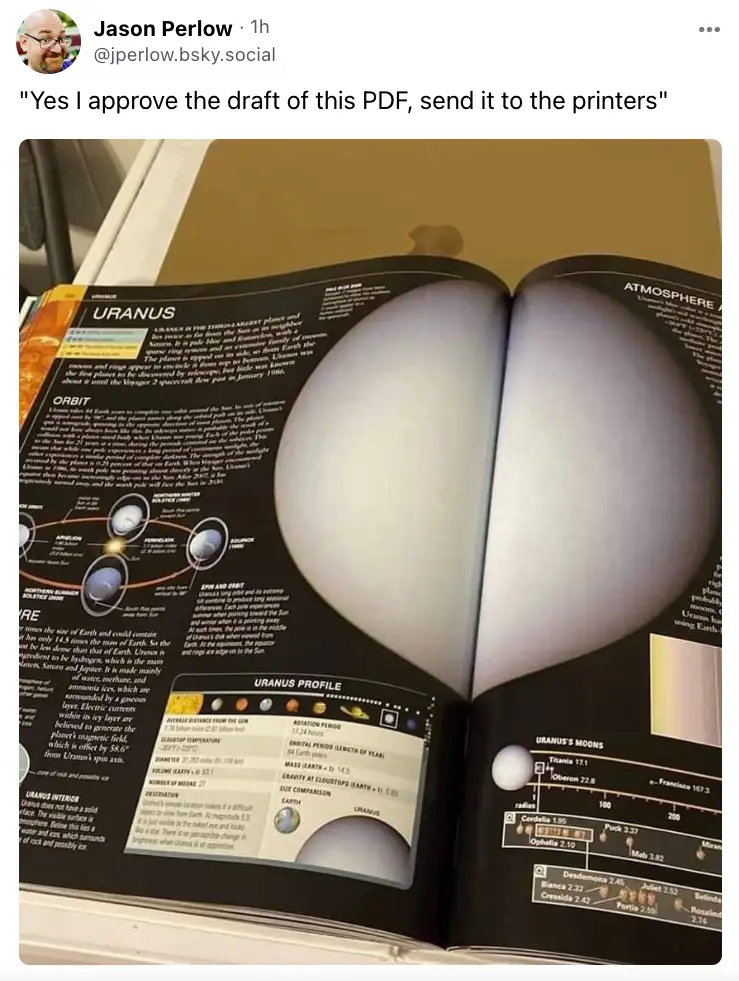 An open book displays a page about the planet Uranus, with a large, heart-shaped object obscuring the center. The overlaid…