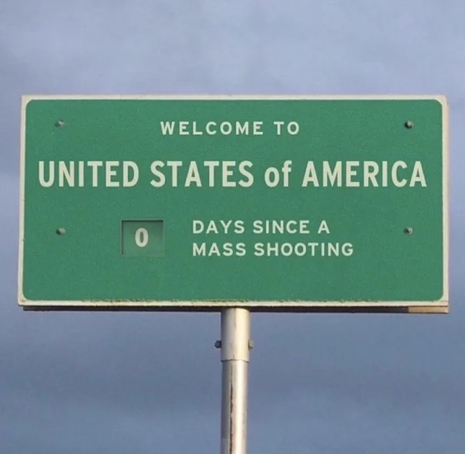 A green U.S. border welcome sign reads 'WELCOME TO UNITED STATES of AMERICA' with a digital display showing '0' below it…