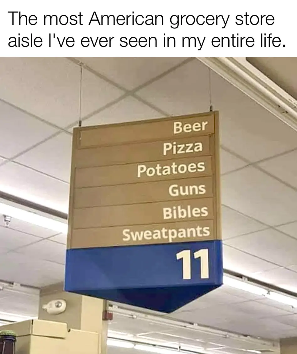 A hanging grocery store aisle sign labeled '11' lists items: Beer, Pizza, Potatoes, Guns, Bibles, Sweatpants. The overlaid…