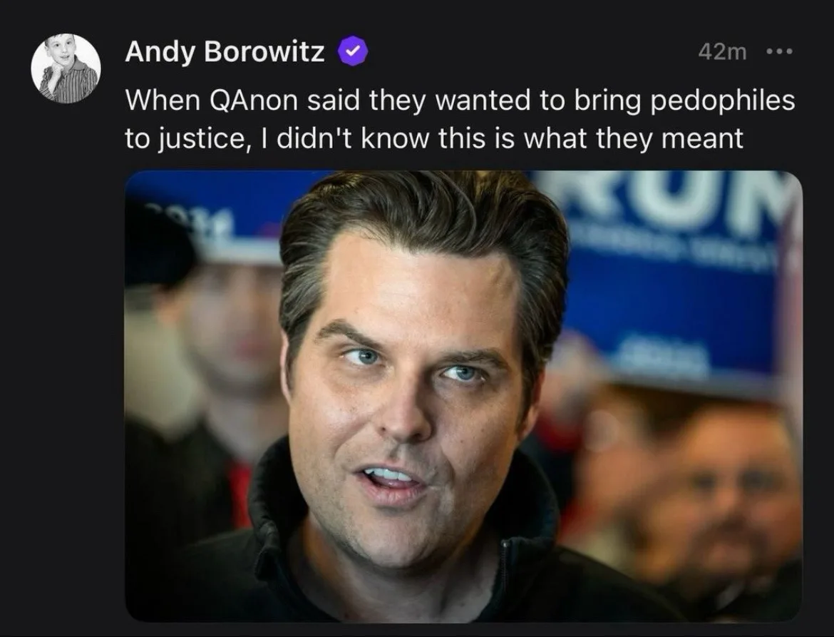 A screenshot of a social media post by Andy Borowitz shows a photo of a man with a surprised or confused facial expression…