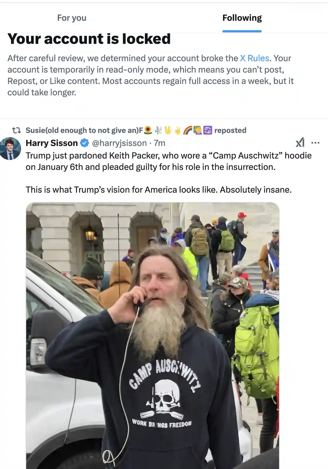 A screenshot of an X (Twitter) post by Harry Sisson showing a man with a long beard wearing a black hoodie with 'CAMP…
