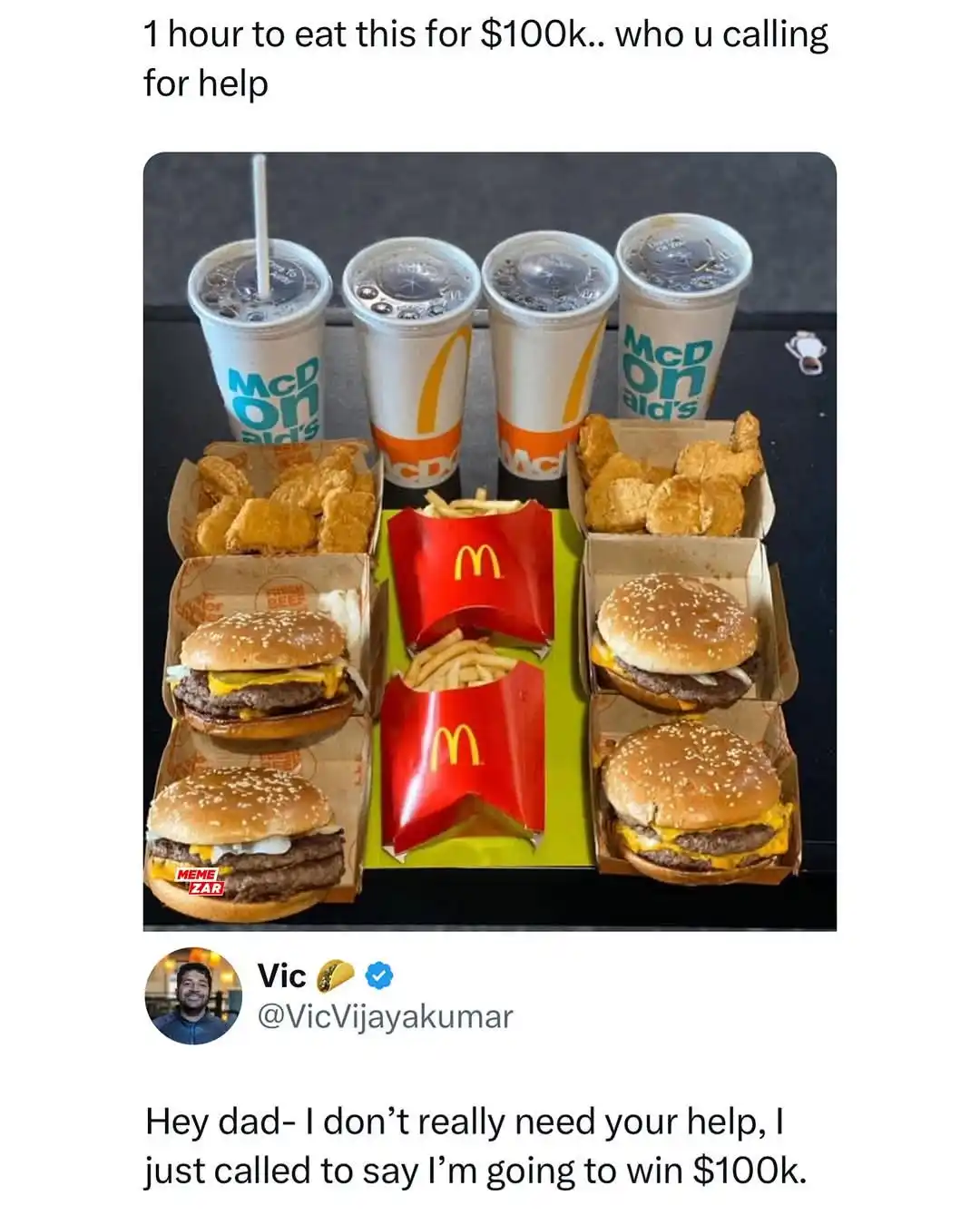 An image displays a large, elaborate McDonald's meal spread on a black surface, featuring four drinks, two boxes of chicken…