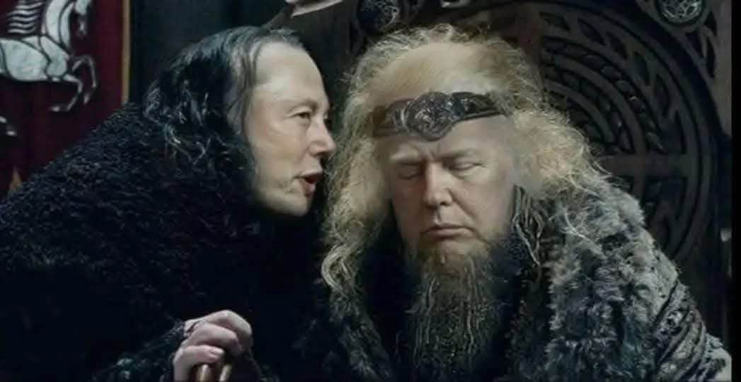 a man with long dark hair and a black fur cloak leans in to whisper to another man with long blonde hair, a beard, and a…