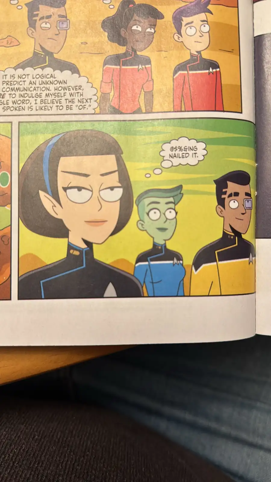 A comic book page from 'Star Trek: Lower Decks' shows three characters in Starfleet uniforms. In the top panel, a character…