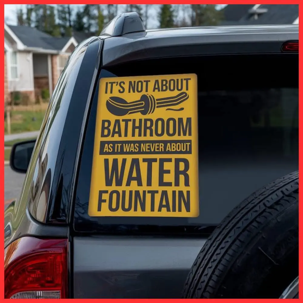 A yellow rectangular sticker is affixed to the rear window of a dark-colored SUV. The sticker features bold black text…