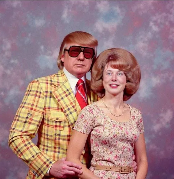 A vintage 1970s studio portrait shows a man with a distinctive hairstyle wearing a yellow plaid jacket and sunglasses…