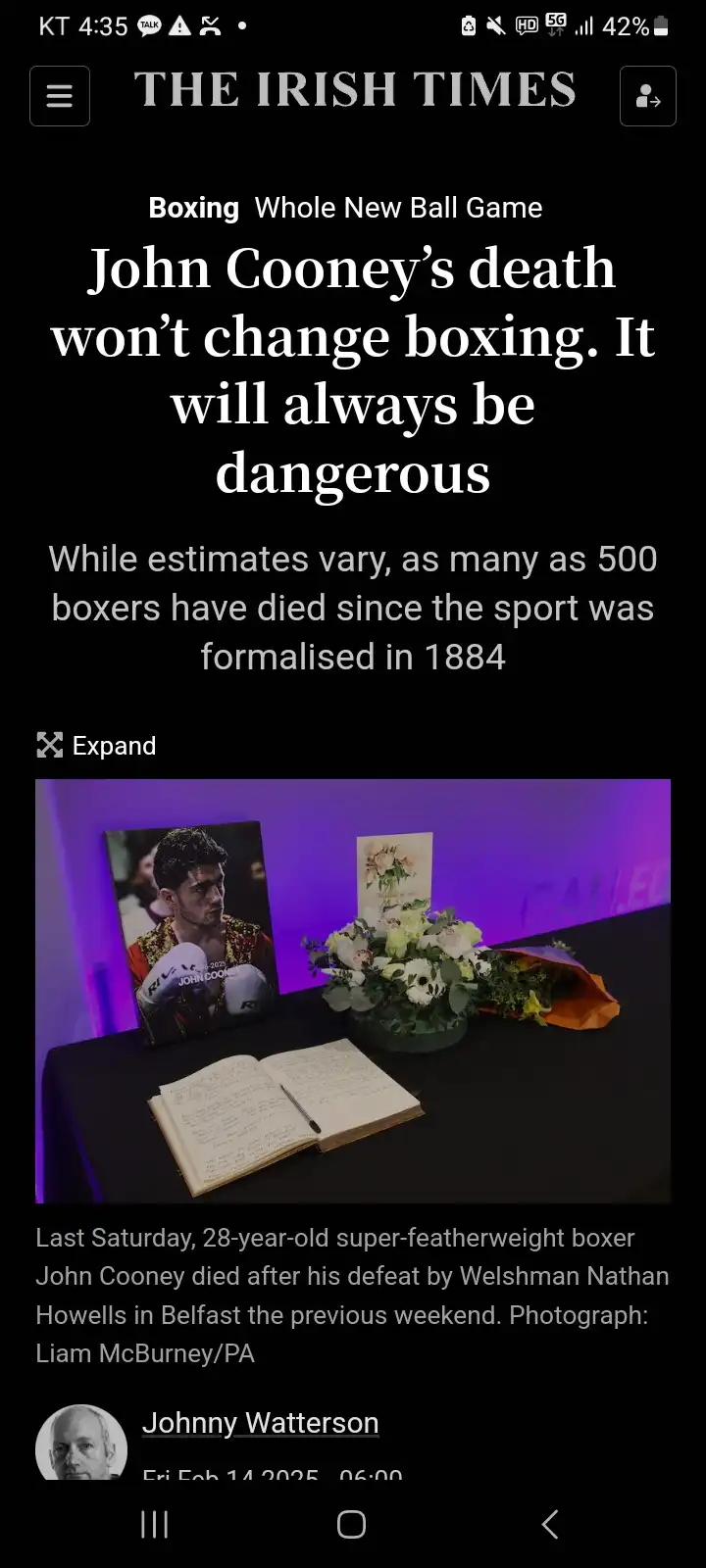 A screenshot of a news article from The Irish Times about boxer John Cooney's death, featuring a photo of his memorial with…