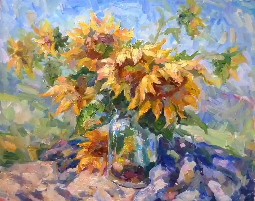 An impressionistic painting shows a glass vase filled with wilting sunflowers against a blue sky background. The flowers are…