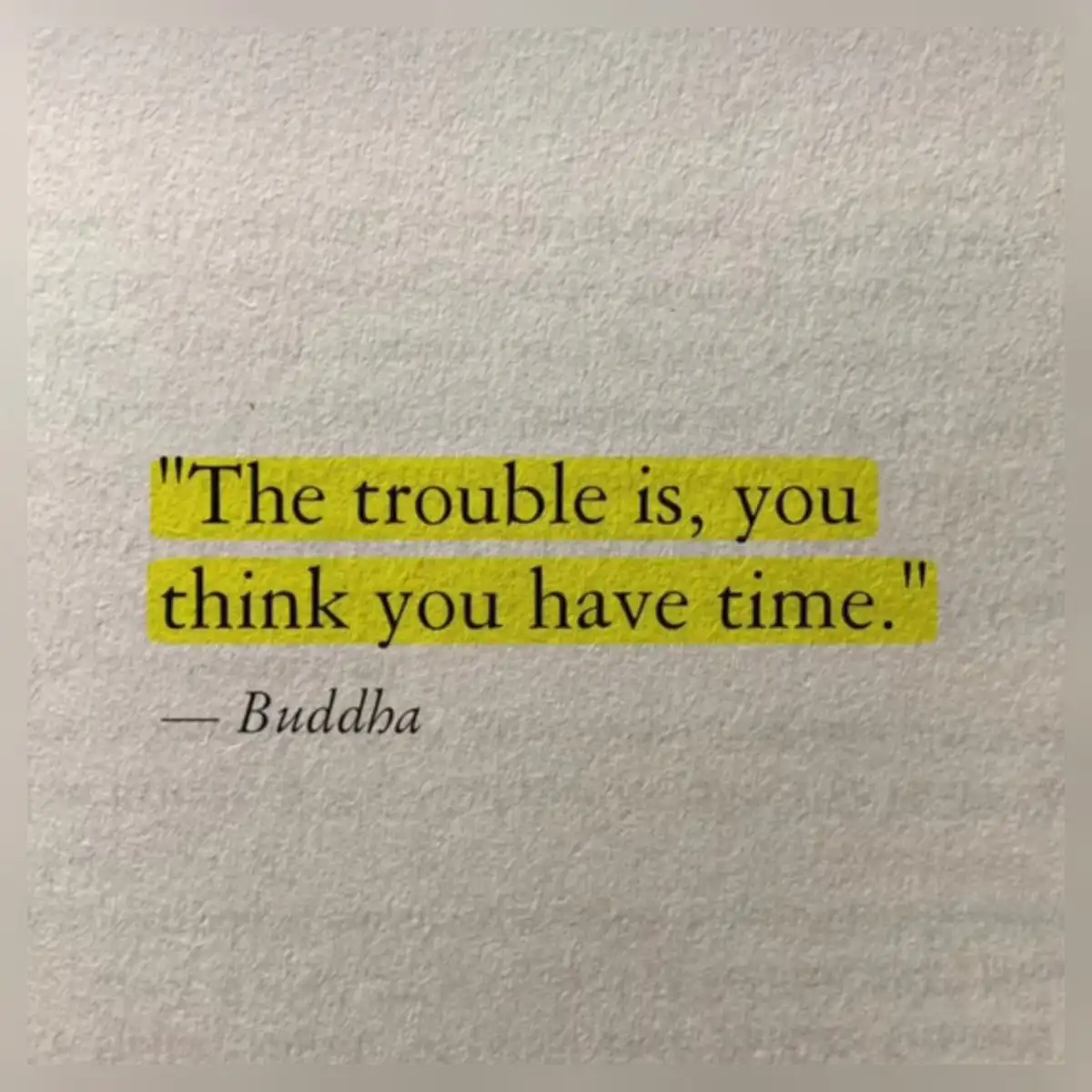 The image displays a textured, light gray paper background with a quote in black serif font, highlighted in yellow. The…