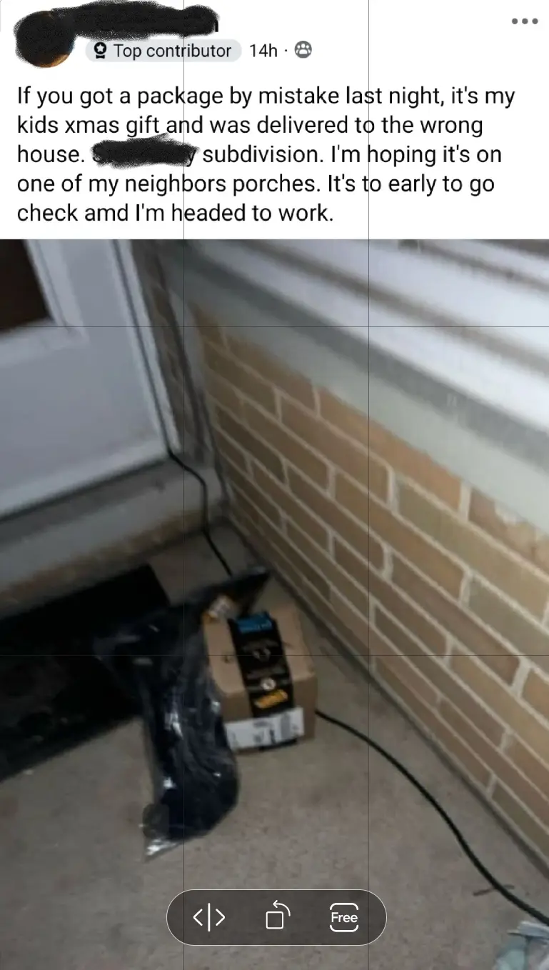 A cardboard Amazon package sits on a concrete porch next to a brick wall and a white door, with a black plastic bag beside…