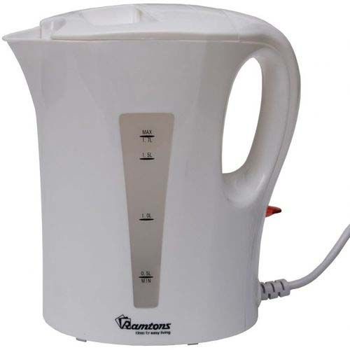 A white electric kettle with a handle and spout, showing water level markings from 0.5L to 1.7L. The brand 'Ramtons' is…