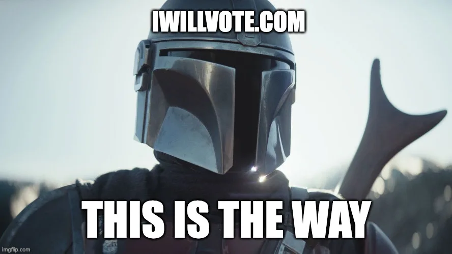The image shows the back of a character in a Mandalorian helmet, holding a weapon, with the text 'IWILLVOTE.COM' at the top…