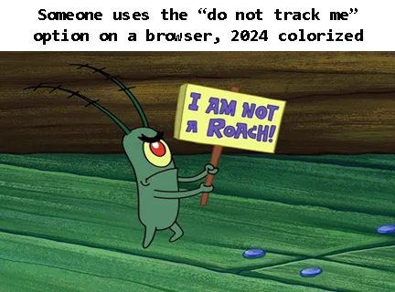 A cartoon green cockroach with long antennae holds a yellow sign that reads 'I AM NOT A ROACH!' while standing on a green…