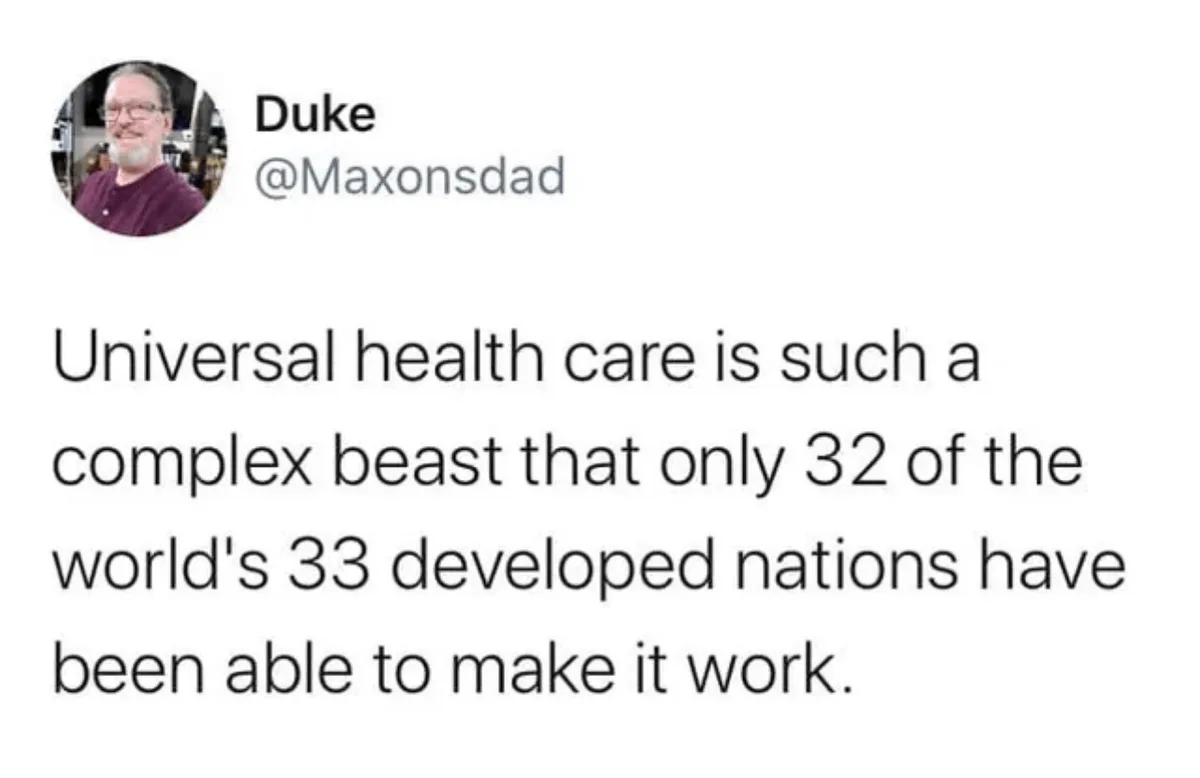 A screenshot of a tweet from user Duke (@Maxonsdad) featuring a photo of a smiling man with glasses and a beard. The tweet…