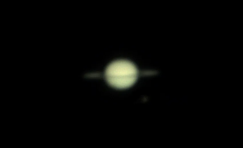 The image displays six panels arranged in two rows of three, each showing a blurry, pale yellowish planet with faint rings…