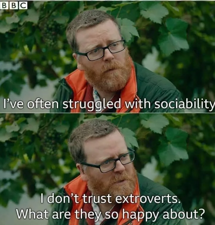A two-panel meme featuring a man with glasses and a beard wearing an orange vest over a green jacket, standing outdoors…