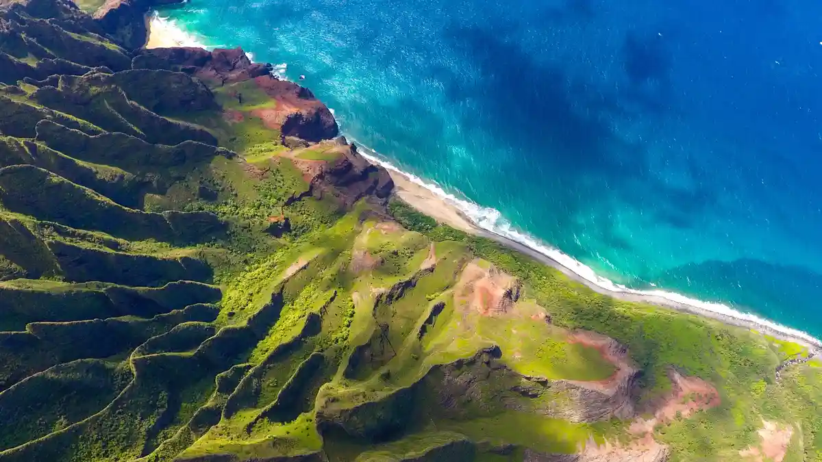 Hawaii's NÃÂ Pali Coast State Park is a breathtaking sight, accessible only by advanced reservations for hiking or…