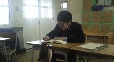 A six-panel sequence shows a student in a classroom initially writing at his desk, then suddenly standing up and…