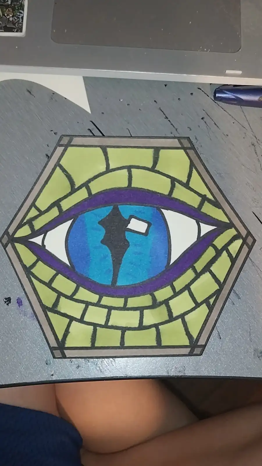 A hand-drawn, stained-glass style illustration of the 'all-seeing eye' symbol, rendered in a hexagonal frame with green…