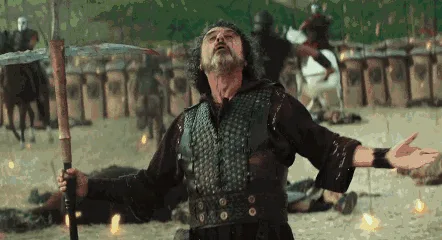 A six-panel sequence from a fantasy battle scene shows a bearded warrior in armor, initially standing defiantly with arms…