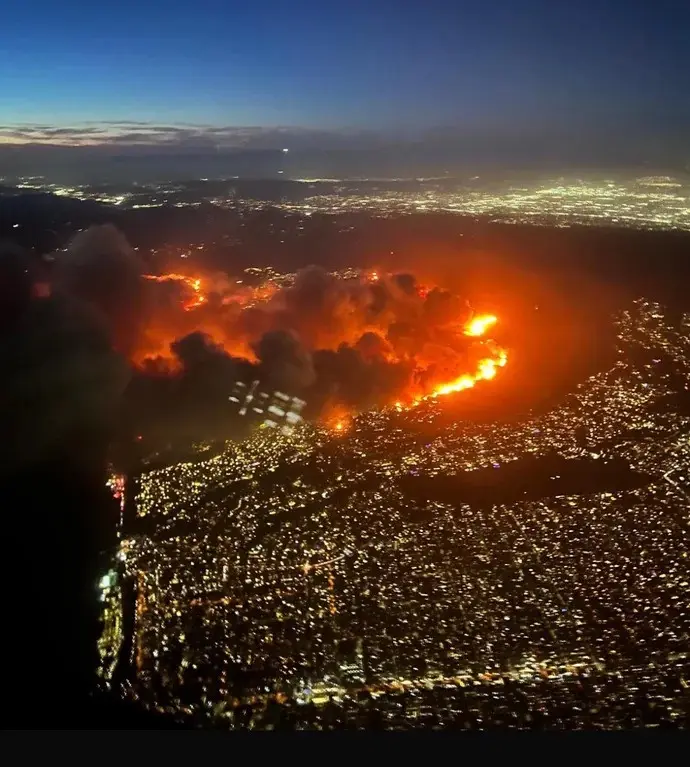 Aerial view of the Palisades fire as we approach LAX.