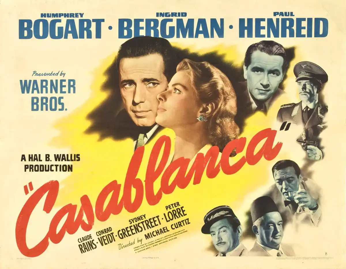 This is a vintage movie poster for the 1942 film 'Casablanca,' featuring prominent actors Humphrey Bogart, Ingrid Bergman…