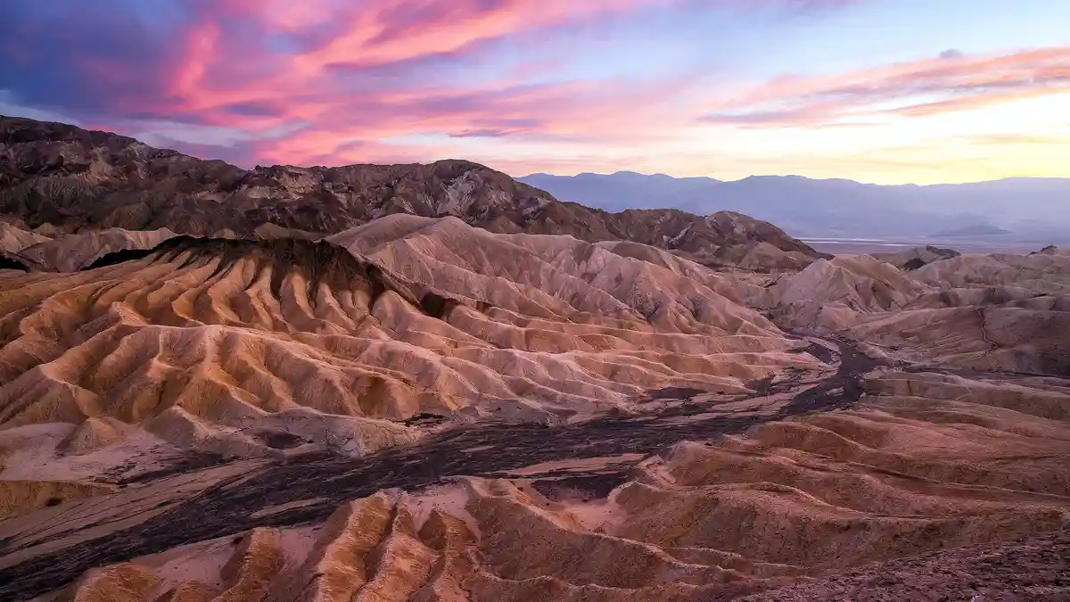 In Death Valley National Park, Zabriskie Point offers a remarkable view of the nation's driest badlands, once a lake bed…