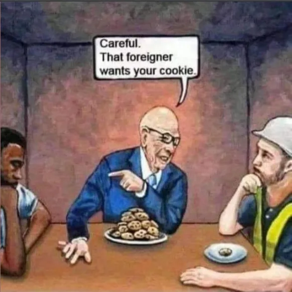 Three men sit at a table; a bald man in a suit points accusingly at a plate of cookies while a speech bubble above him reads…