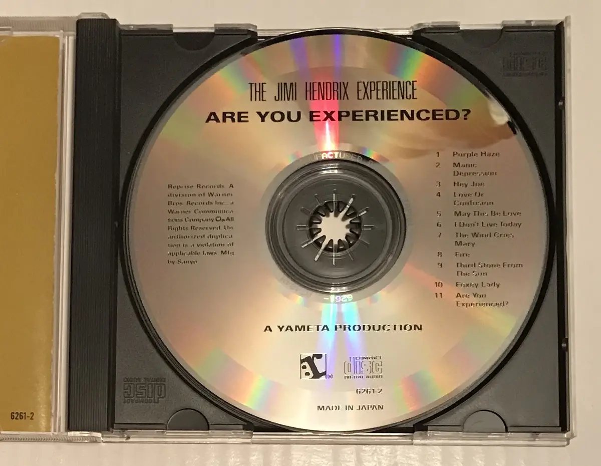 A close-up photo of a CD in its case, showing the album 'Are You Experienced?' by The Jimi Hendrix Experience. The disc's…
