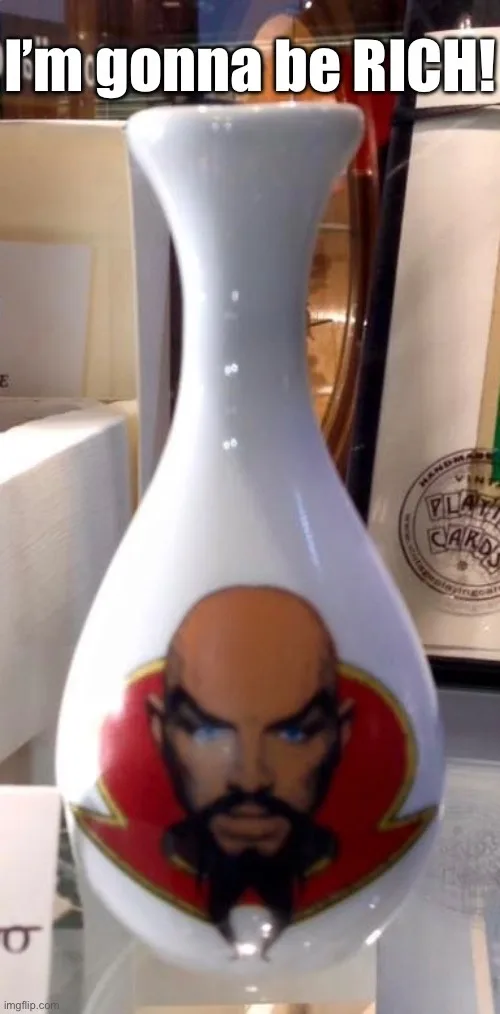 A white ceramic sake bottle with a cartoon depiction of a bald, bearded man with a stern expression and red circular…