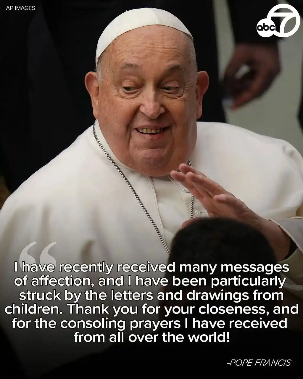 A close-up photo of Pope Francis smiling warmly while gesturing with his hand, overlaid with a quote attributed to him…