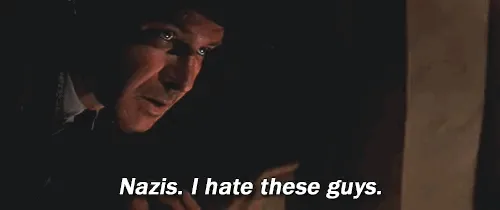 The image displays six identical frames of a man in a dark, shadowy room, each showing him saying 'Nazis. I hate these…