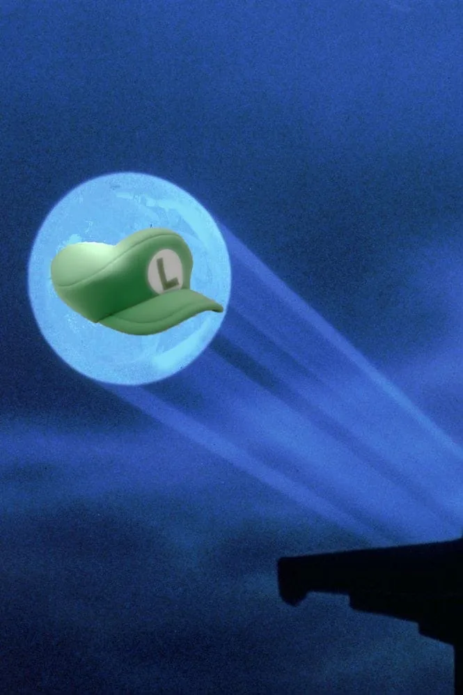 A green Luigi hat with a white 'L' emblem is superimposed over a large, glowing blue moon in a dark night sky. Below, the…