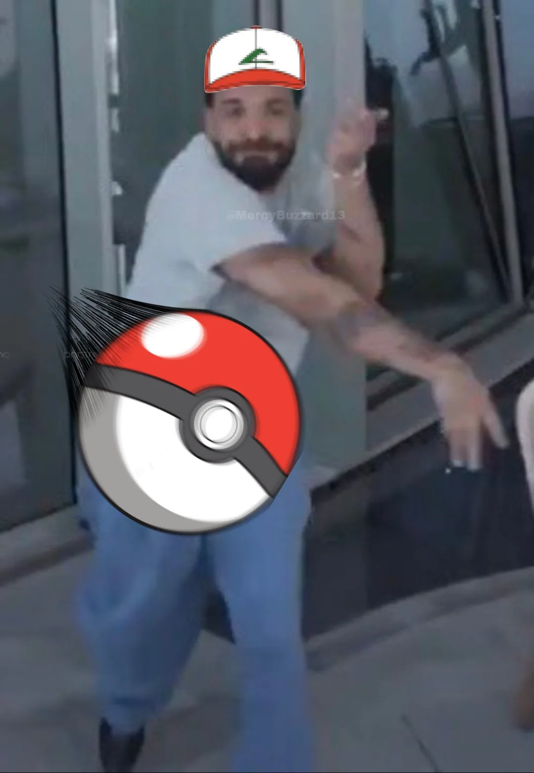 A blurry photo of a bearded man in a white t-shirt and blue jeans, wearing a red and white baseball cap with a green logo…